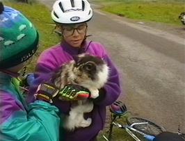 Lukas Wooller admires Mrs Fergusson's adorable cat outside her b&b in Milltown, Applecross